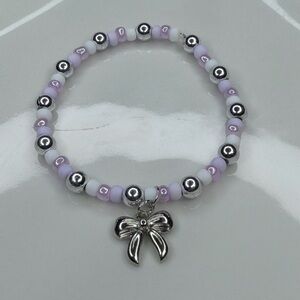 Chic Silver and Lavender Beaded Bracelet with Bow Charm